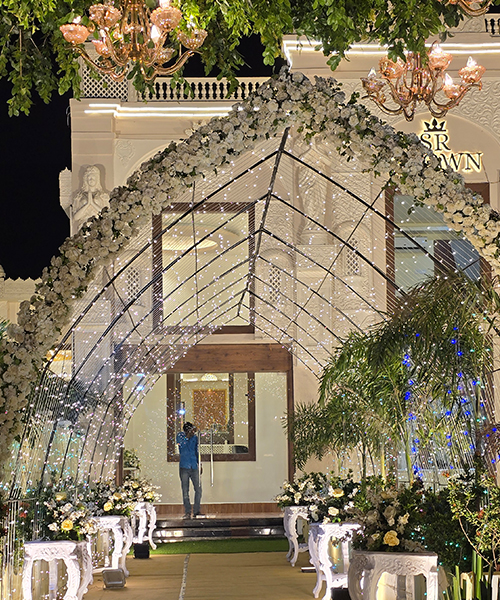 Elegant wedding venue with beautiful floral arrangements and soft lighting